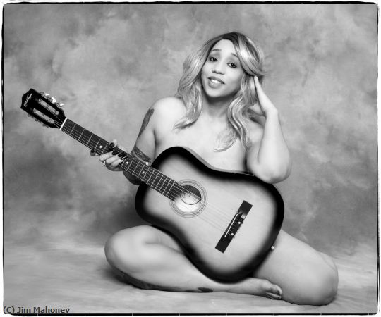 Missing Image: i_0054.jpg - Sasha Sitting with Guitar
